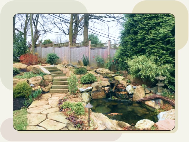 Beautiful hardscaping scene with path and koi pond